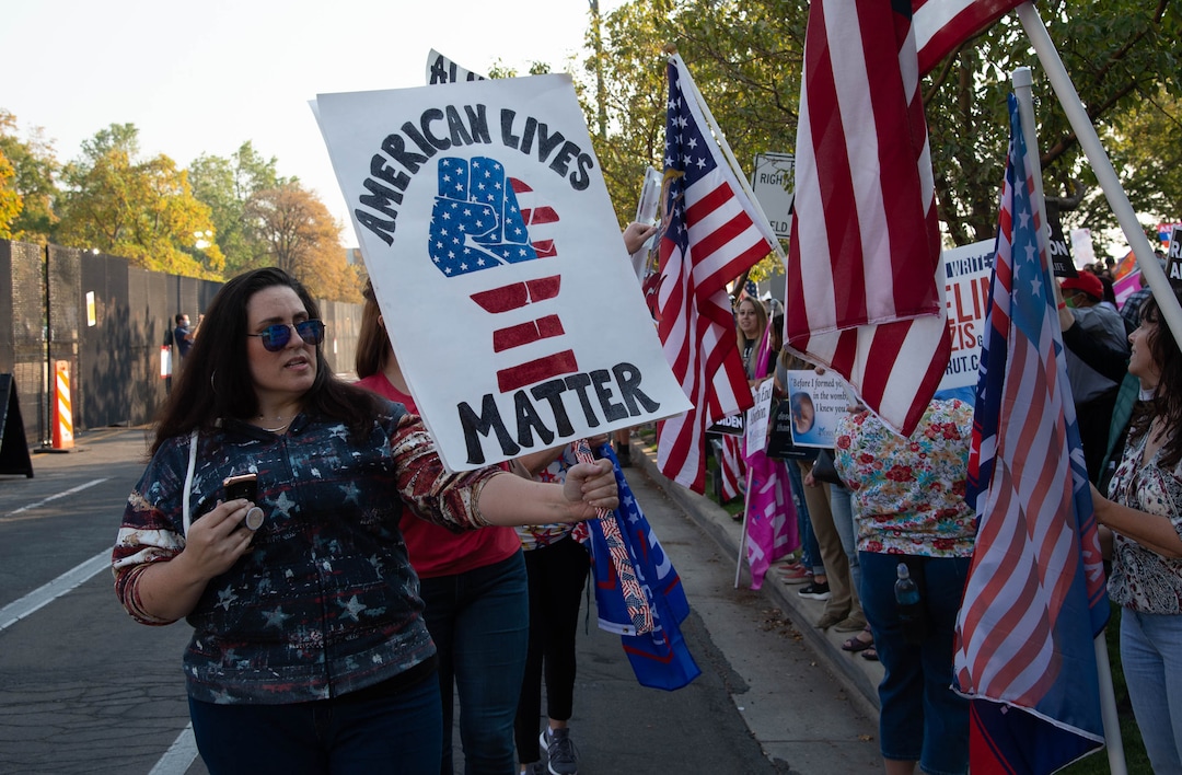 (Francisco Kjolseth  |  The Salt Lake Tribune) Supporters of President Donald Trump rally outside of Kingsbury Hall on the University of Utah campus in Salt Lake City on Wednesday, Oct. 7, 2020, before the vice presidential debate.