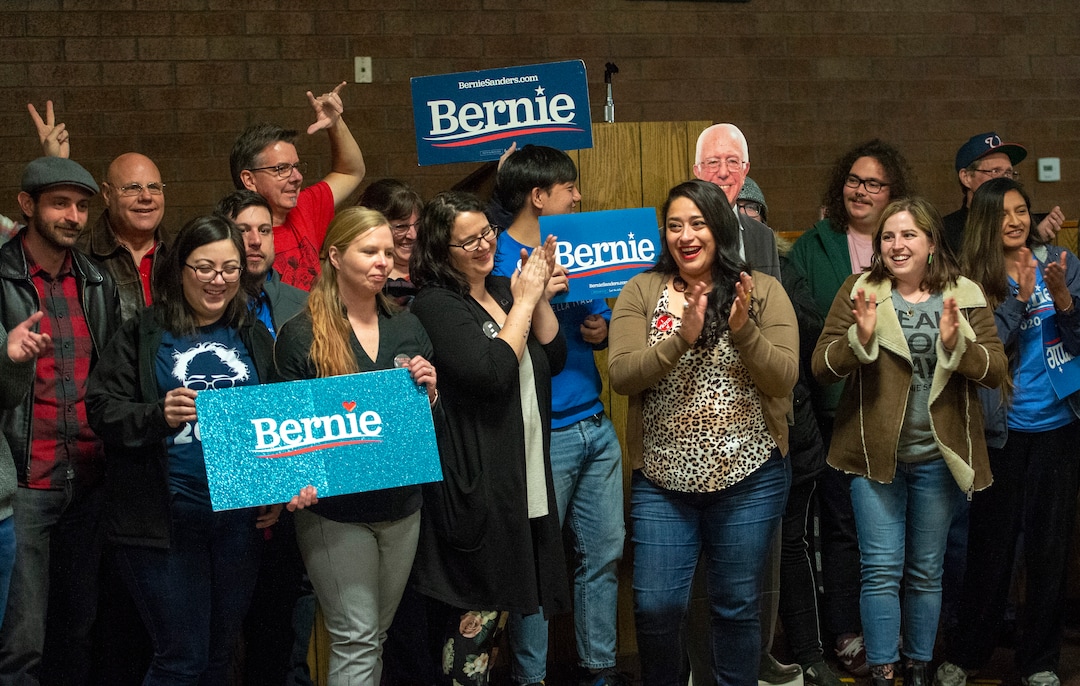(Rick Egan  |  The Salt Lake Tribune)  Bernie Sanders supporters cheer as the watch the returns come in at an election watch party at the Teamsters & Chauffeurs Union in West Valley, on Super Tuesday March 3, 2020