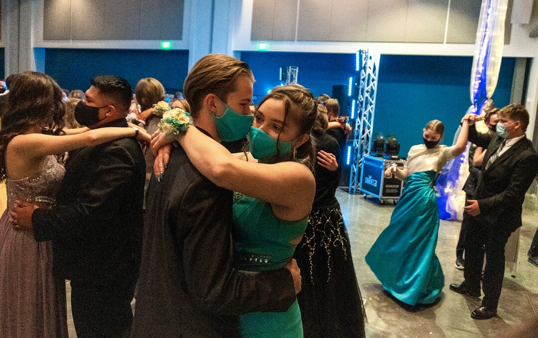 (Rick Egan | The Salt Lake Tribune) Chance Carey and Ashlynn Panek (center) enjoy a slow dance at the Cyprus High school Prom, at the Viridian Event Center, on Saturday, April 24, 2021.