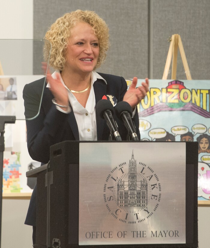 (Rick Egan  |  The Salt Lake Tribune)   Salt Lake City Mayor Jackie Biskupski claps for teh Jambo Africa drummers from Burundi, before delivering the State of the City address at the Horizonte Instruction and Training Center, Wednesday, January 31, 2018.


