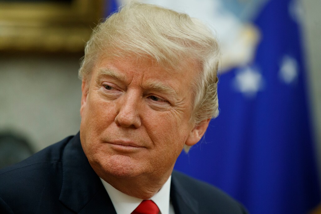 FILE - In this Jan. 10, 2018, file photo, President Donald Trump listens during a meeting in the Oval Office of the White House, in Washington. Casting a cloud over already tenuous negotiations, President Donald Trump said Sunday, Jan. 14, that Deferred Action for Childhood Arrivals program, or DACA, a program that protects immigrants who were brought to the U.S. as children and live here illegally is “probably dead” and blamed Democrats, days before some government functions would start shutting down unless a deal is reached. (AP Photo/Evan Vucci, File)
