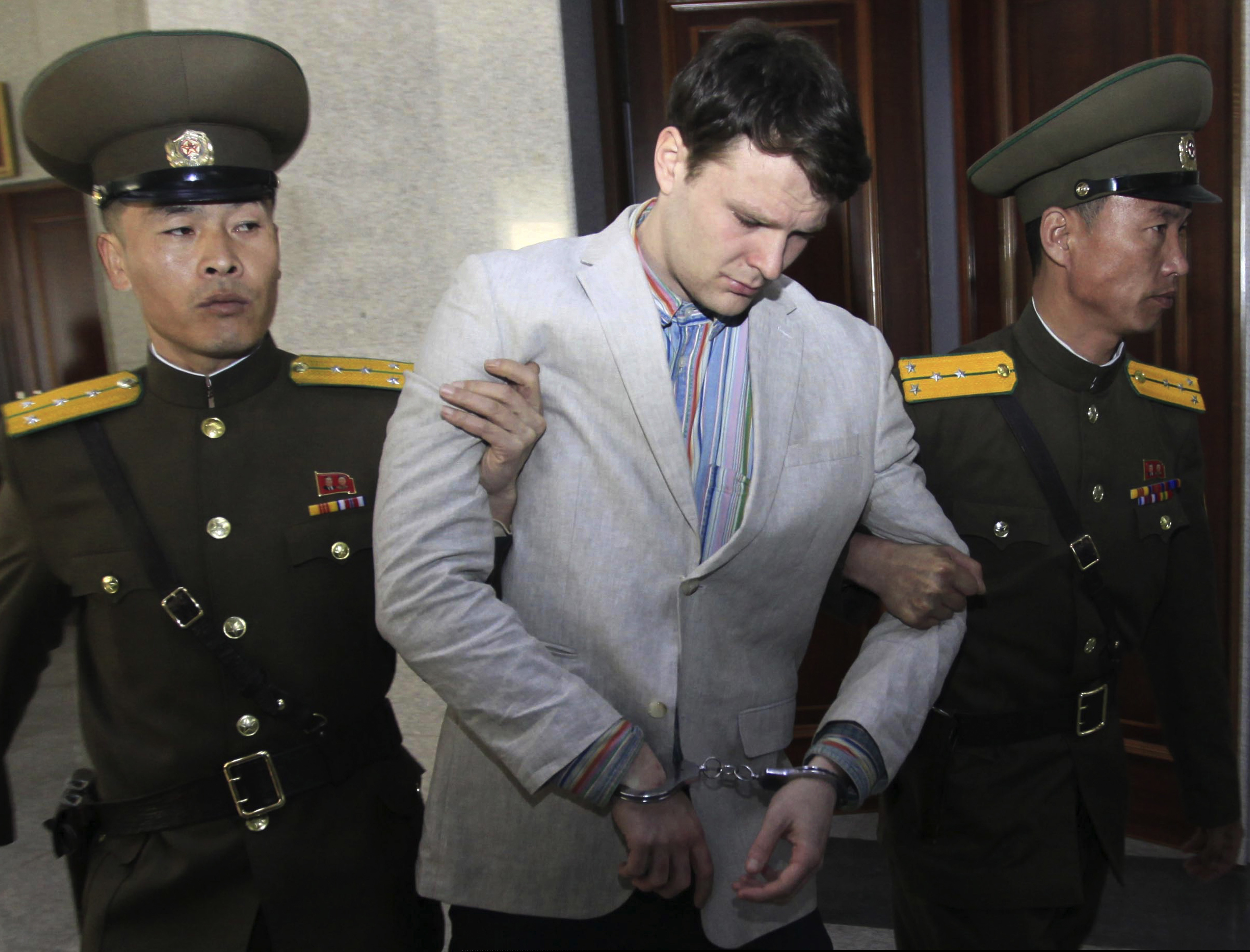 (AP Photo/Jon Chol Jin, File)In this March 16, 2016, file photo, American student Otto Warmbier, center, is escorted at the Supreme Court in Pyongyang, North Korea. North Korea reportedly insisted the U.S. pay $2 million in medical costs in 2017 before it released dWarmbier while he was in a coma.