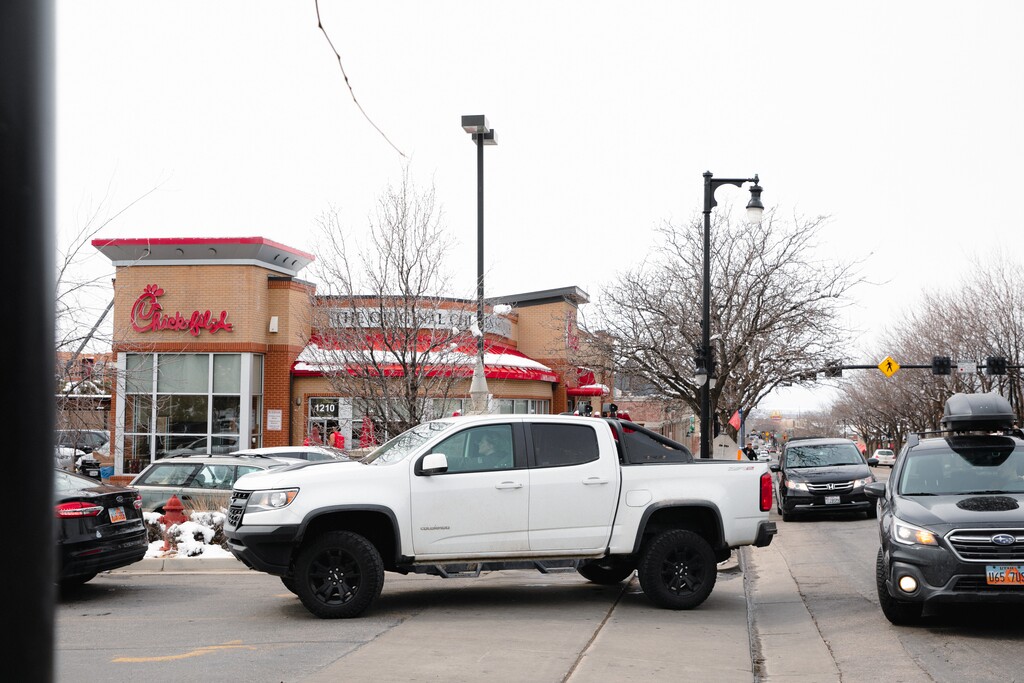 (Rachel Rydalch | The Salt Lake Tribune) A Chick-fil-A location on 2100 South in Sugar House frequently has a long drive-thru line, Tuesday, March 8, 2022. The traffic often builds up onto city roads causing congestion.
