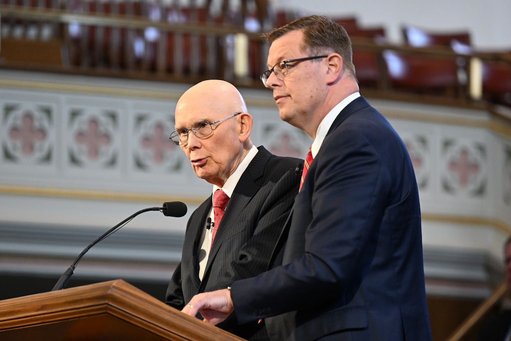 (Leslie Nilsson | The Church of Jesus Christ of Latter-day Saints) Dallin Oaks, left, is joined by Clark Gilbert during a devotional for Ensign College students on Temple Square in 2022. Oaks has named Gilbert as the church's newest apostle.