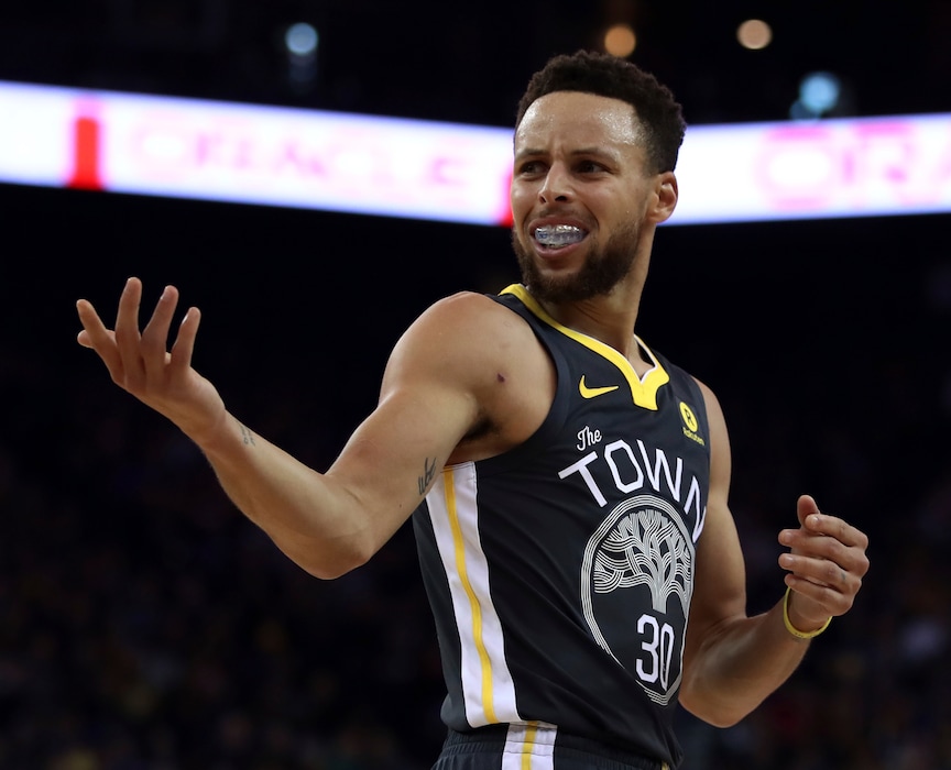 Golden State Warriors' Stephen Curry reacts to a referee's call during the first half of the team's NBA basketball game against the Boston Celtics on Saturday, Jan. 27, 2018, in Oakland, Calif. (AP Photo/Ben Margot)