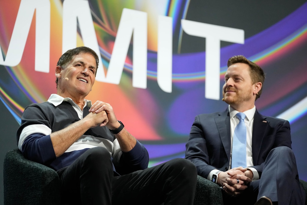 (Francisco Kjolseth | The Salt Lake Tribune) Mark Cuban of Cost Plus Drugs, center, and Chris Klomp, a top Medicare administrator, speak during the Silicon Slopes Summit at the Salt Palace Convention Center in Salt Lake City on Friday, Feb. 6, 2026.