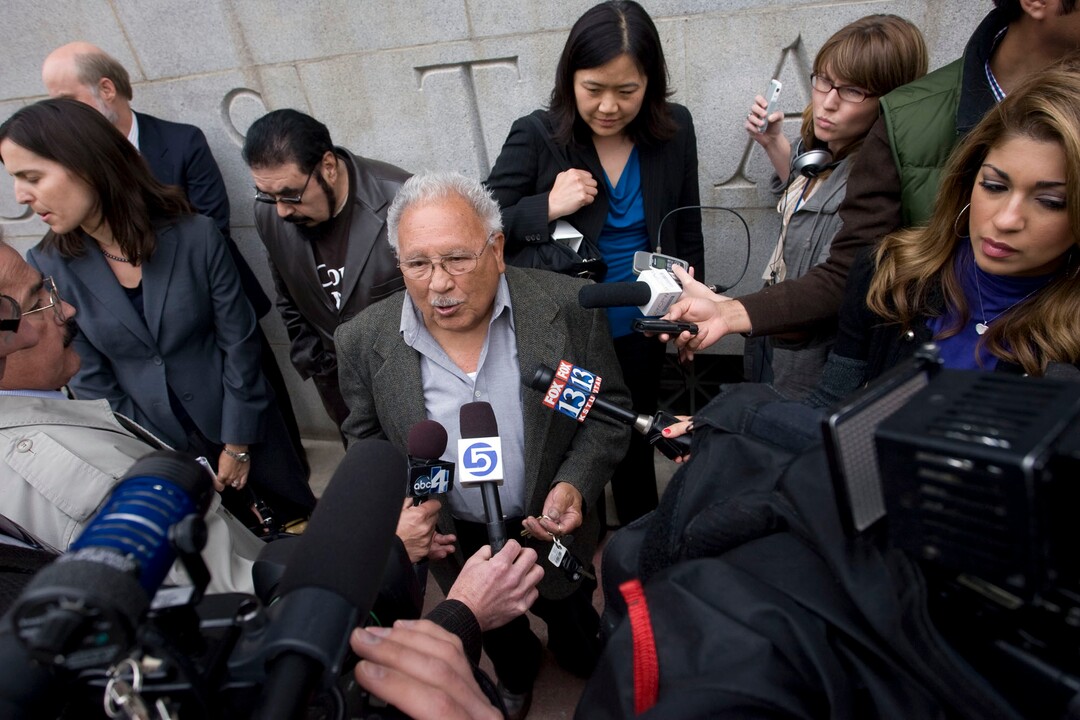 (Steve Griffin  |  Tribune file photo)  Archie Archuleta, a plaintiff in a suit against Utah's new immigration enforcement law, talks with reporters outside the Frank Moss Federal Courthouse in Salt Lake City on May 11, 2011 Judge Clark Waddoups issued a temporary restraining order against the law.