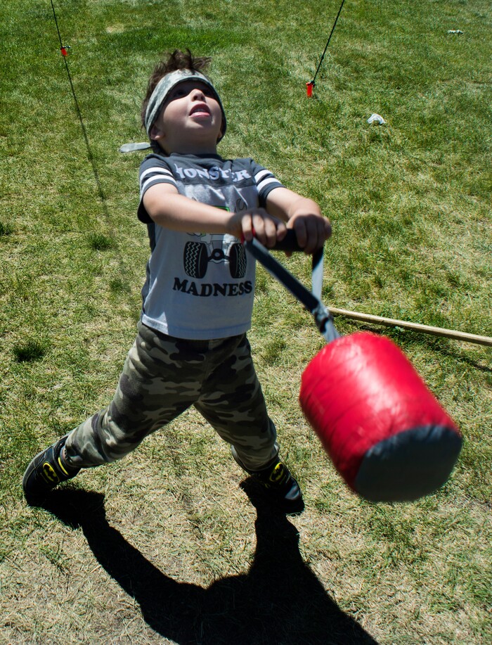 (Rick Egan  |  The Salt Lake Tribune)      Jack Christensen, 6, West Jordan, does the kits weight over the bar, at the 44th annual Utah Scottish Festival and Highland Games at the Utah State Fairgrounds, Sunday, June 10, 2018.