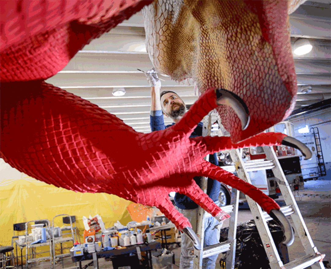 (Trent Nelson | The Salt Lake Tribune)  Artist Stephen Kesler works on a giant Red Iguana, to be placed in front of the Salt Lake City restaurant's #2 location. Kesler created the giant whales and other sea creatures for the Living Planet Aquarium. The Red Iguana is 14 feet high and more than 30 feet long.