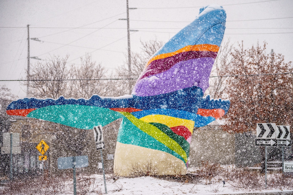 (Trent Nelson  |  The Salt Lake Tribune) Snow falls on the whale sculpture "Out of the Blue" in Salt Lake City on Wednesday, Dec. 28, 2022.