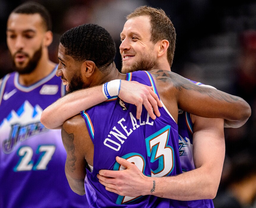 (Trent Nelson | The Salt Lake Tribune) Utah Jazz forward Joe Ingles (2) and Utah Jazz forward Royce O'Neale (23) embrace after an Ingles three-pointer as the Utah Jazz host the Portland Trail Blazers, NBA basketball in Salt Lake City on Thursday, Dec. 26, 2019.