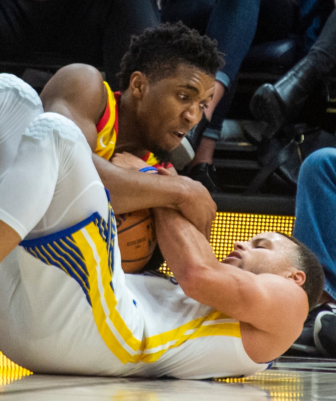 (Rick Egan  |  The Salt Lake Tribune)  Utah Utah Jazz guard Donovan Mitchell (45) goes for a loose ball along with Golden State Warriors guard Stephen Curry (30), in NBA action between Utah Jazz and Golden State Warriors, in Salt Lake City, Wednesday, Dec. 19, 2018.