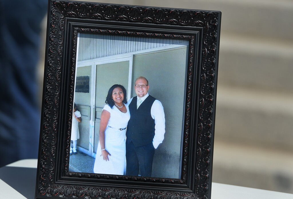Scott Sommerdorf   |  The Salt Lake Tribune  Thamara Caleo and Josh Holt, who are currently jailed in Venezuela, appear in a family photo displayed at a rally on the east steps of the Utah State Capitol, Saturday, July 30, 2016. 