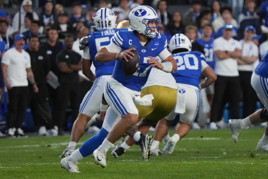 (George Frey | Special to The Tribune) BYU Cougars quarterback Bear Bachmeier (47) looks to pass the ball during a game against the Notre Dame Fighting Irish at LaVell Edwards Stadium on October 17, 2026.