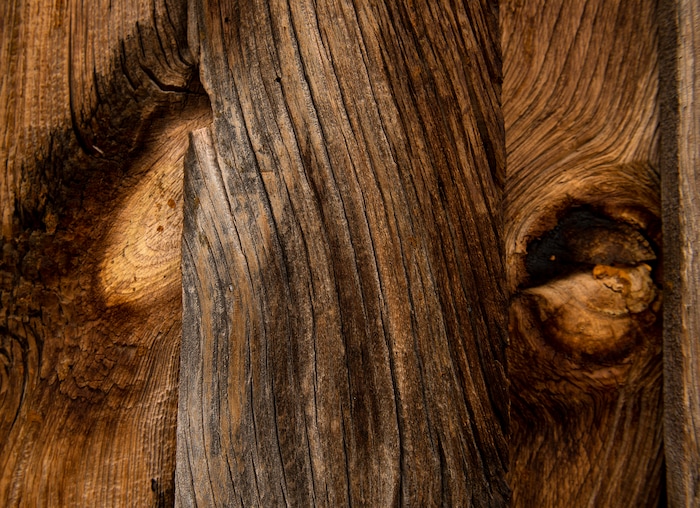 (Leah Hogsten  |  The Salt Lake Tribune) The soft pine planks of board and batten cabin. The frontier house was dilapidated and boarded up and had sat vacant for 50 years, when Dawn House purchased the 1886 home in Torrey.