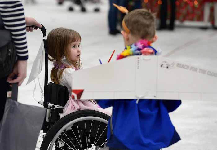 (Scott Sommerdorf   |  The Salt Lake Tribune)   Annika Ellefsen and her brother both earned their wings as patients from Primary ChildrenÕs and Shriners Hospitals were treated to a unique experience on Saturday at a Delta hangar of the Slat Lake International airport. They boarded a Boeing 737 which taxied to their final destinationÑSantaÕs Winter Wonderland, Saturday, December 2, 2017.  