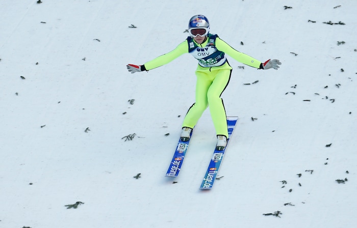 Sarah Hendrickson from the U.S. competes to place third at the Ski Jumping World Cup women's event in Ljubno, Slovenia, Sunday, Feb. 15, 2015. (AP Photo/Darko Bandic)
