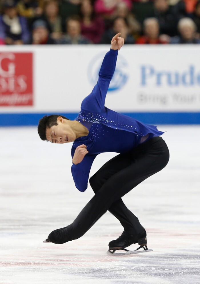 Nathan Chen competes in the men's free skate program of the U.S. Figure Skating Championships, Sunday, Jan. 24, 2016, in St. Paul, Minn. (AP Photo/Jim Mone)