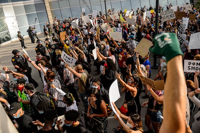 (Trent Nelson  |  The Salt Lake Tribune) Protesters in front of the Public Safety Building during a protest against police brutality in Salt Lake City on Monday, June 1, 2020.
