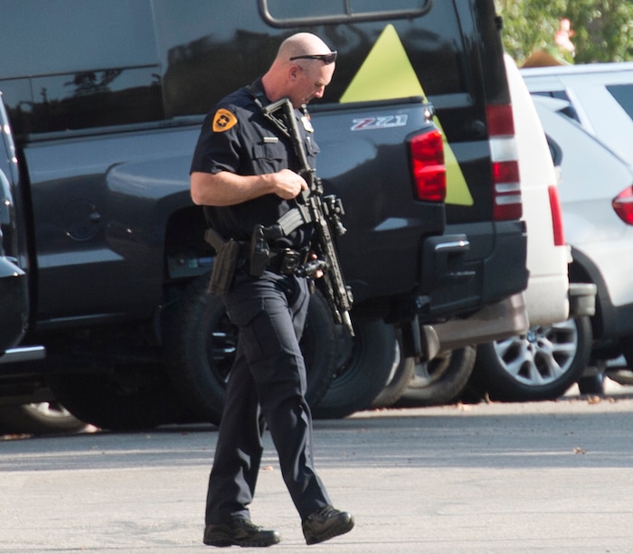 (Rick Egan  |  The Salt Lake Tribune)   Police stand by as swat teams search buildings on Rio Grande Street for a suspect that fired shots at a police officer,  Wednesday, Sept. 5, 2018.



