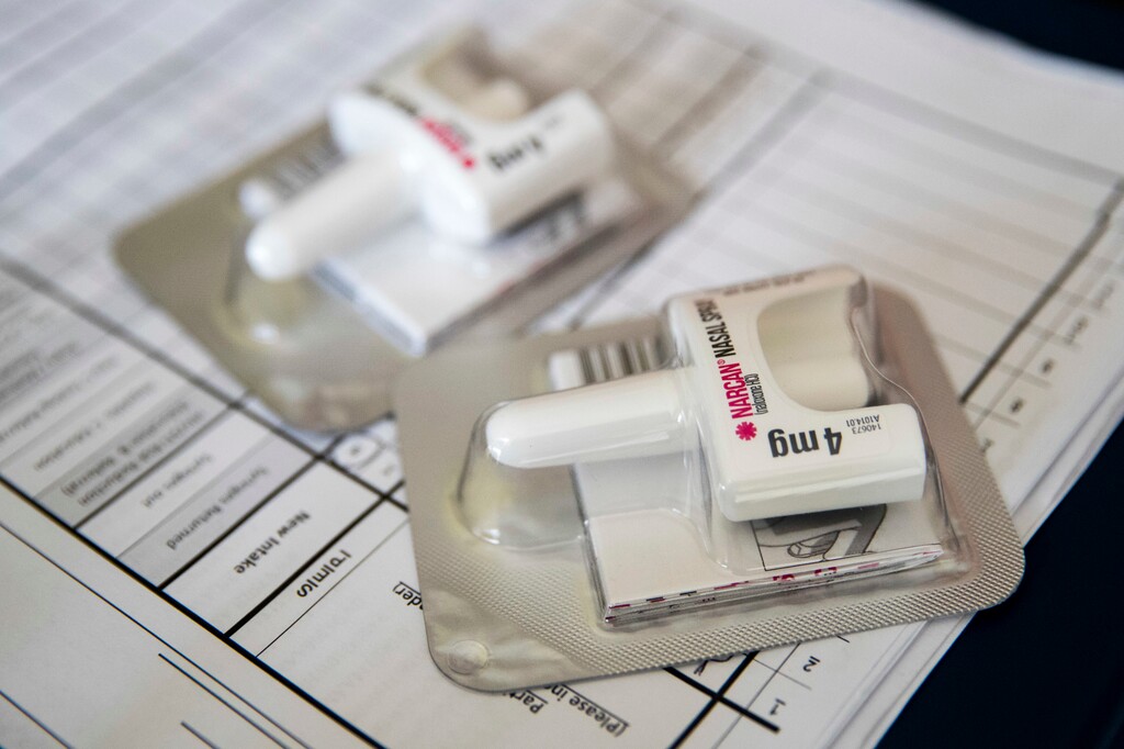 (Mary Altaffer | AP file photo)  In this Tuesday, July 3, 2018 file photo, a device which delivers naloxone lies on a counter as a health educator gives instructions on how to administer it in the Brooklyn borough of New York.
