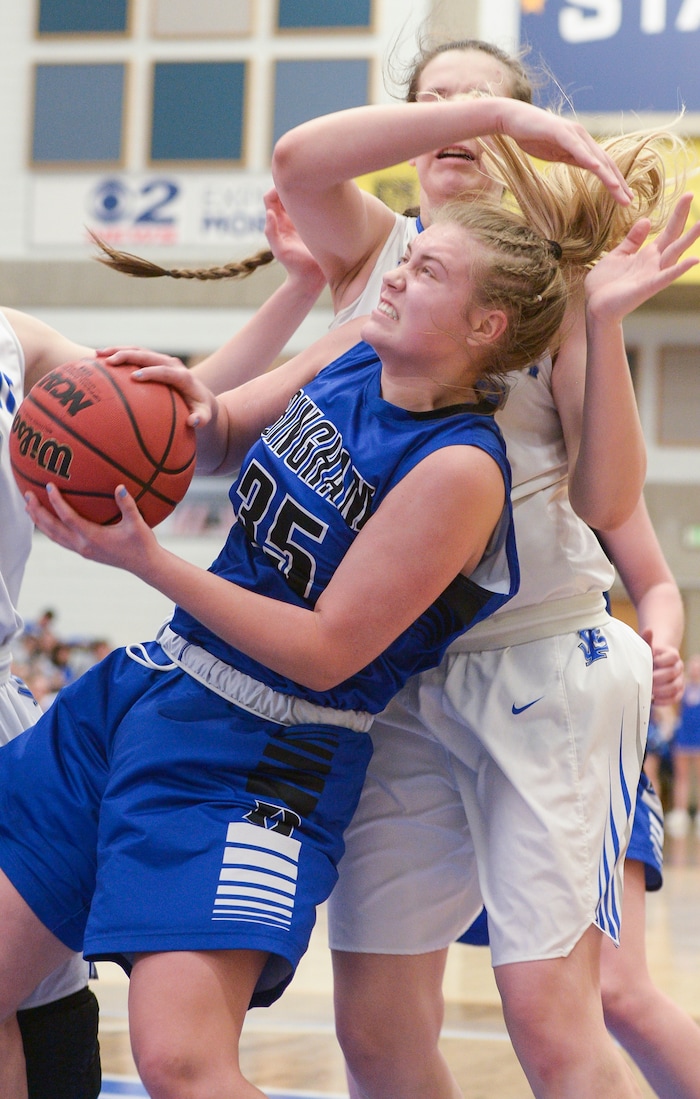 (Leah Hogsten  |  The Salt Lake Tribune) Bingham's Jaycee Lichtie (35) is fouled on her way to the net. Fremont defeated Bingham 61-47 to win the 6A High School Girls' Basketball Tournament title at SLCC in Taylorsville,Saturday, Feb. 24, 2018. 