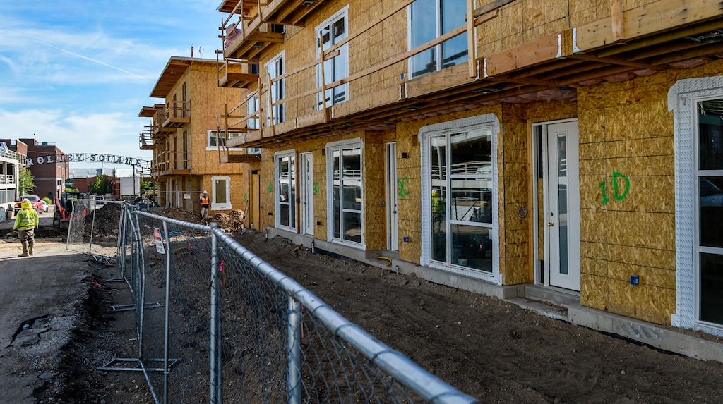 (Leah Hogsten  |  The Salt Lake Tribune)  Construction workers at the site of Liberty Townhouse Apartments located at 500 South and 700 East, Sept. 17, 2019.