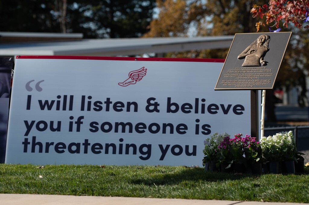 (Francisco Kjolseth  |  The Salt Lake Tribune) People gather for a memorial walk on the track where University of Utah student and track athlete Lauren McCluskey used to compete on the two-year anniversary of her murder on Thursday, Oct. 22, 2020. 
