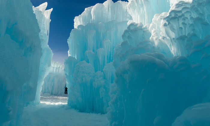 Leah Hogsten | The Salt Lake Tribune A crew of 50 work on the installation, Friday, Jan. 4, 2019. The idea started with a backyard castle in Alpine followed by an ice castle in downtown Midway in 2009. Ice Castles is open for the winter Saturday, Jan. 5, at Homestead Resort. This is the ninth season the popular frozen art installation is drawing visitors to walk around the giant LED-lit icicle formations.