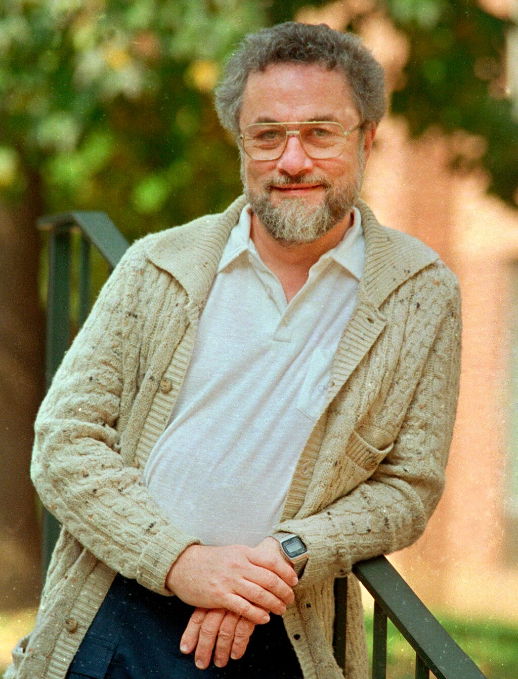 FILE - In this October 1987, file photo, Adrian Cronauer, a disc jockey on the Saigon-based Dawn Buster radio show from 1965-1966 whose experiences in the Vietnam War were chronicled in the movie "Good Morning, Vietnam," poses outside his home in Philadelphia, Pa. Cronauer died Wednesday, July 18, 2018. He was 79. Cronauer opened his Armed Forces Radio show with “Goooooood morning, Vietnam!” (AP Photo/Charles Krupa, File)