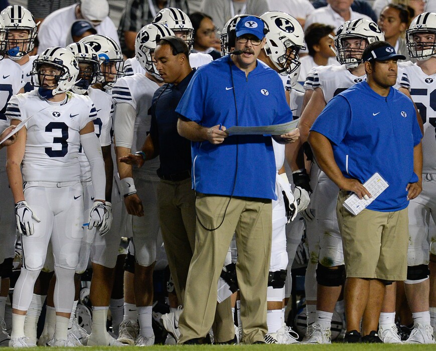 (Francisco Kjolseth  |  The Salt Lake Tribune)  BYU offensive coordinator Jeff Grimes coordinates his line during the second half of the NCAA college football game, Saturday, Sept. 8, 2018, at LaVell Edwards stadium in Provo, Utah.
