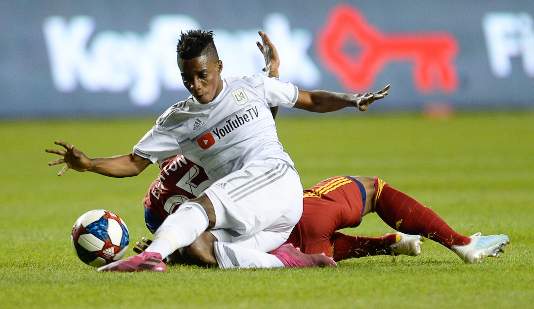 (Francisco Kjolseth  |  The Salt Lake Tribune)  Real Salt Lake midfielder Everton Luiz (25) gets tangled up with Los Angeles FC forward Latif Blessing (7) as Real Salt Lake hosts Los Angeles FC at Rio Tinto Stadium in Sandy on Saturday, Aug. 17, 2019.