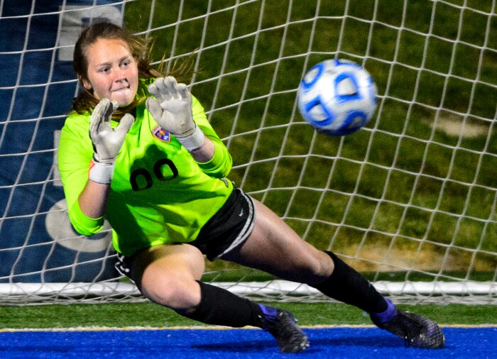 (Steve Griffin | The Salt Lake Tribune) Timpview goalkeeper Marren Nielsen makes a diving save during the 5A semifinal girl's soccer match against Timpanogos at Juan Diego High School in Draper Tuesday October 17, 2017.