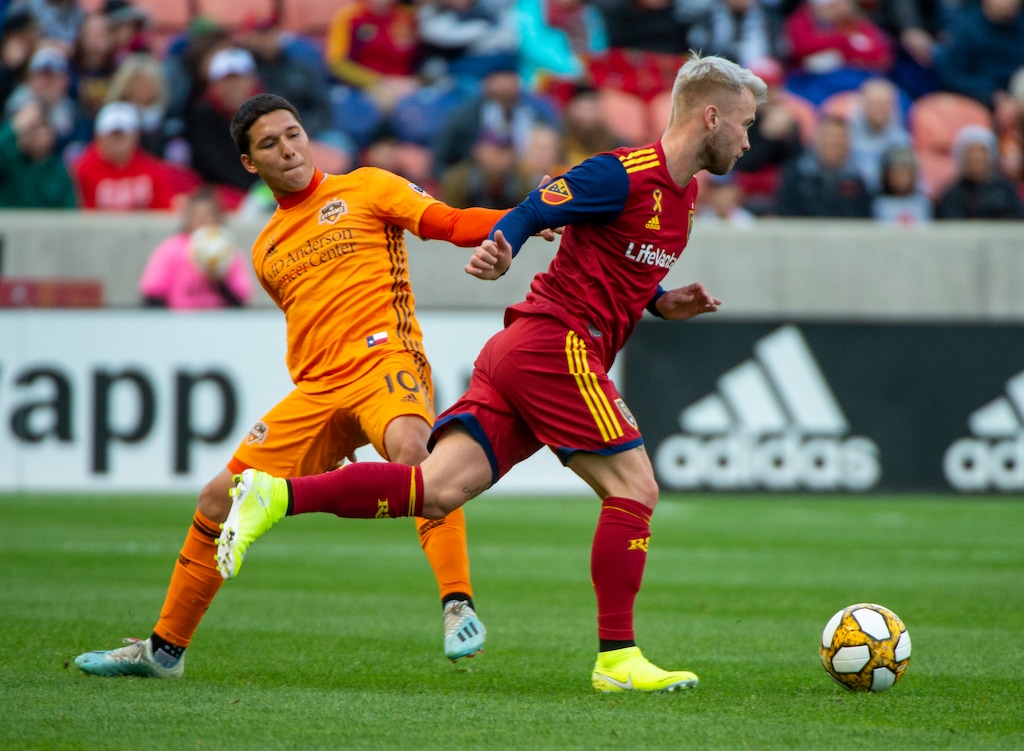 (Rick Egan  |  The Salt Lake Tribune) Real Salt Lake midfielder Albert Rusnak (11) gets past Houston Dynamo midfielder Tomas Martinez (10) in MLS soccer action, at Rio Tinto Stadium, Sunday, Sept. 29, 2019.