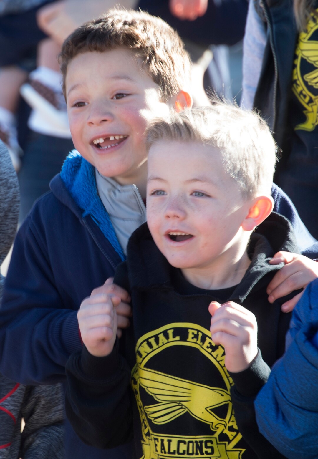 (Rick Egan  |  The Salt Lake Tribune) First graders Diego Sosa and Tate Meacham, react as Santa and Mrs Claus arrive in a helicopter, at Centennial Elementary School, in Roosevelt, Utah, as volunteer pilots from the Utah Wing of Angel Flight West,  brought school supplies and gifts to students  on their annual Santa Flight. Friday, December 8, 2017.