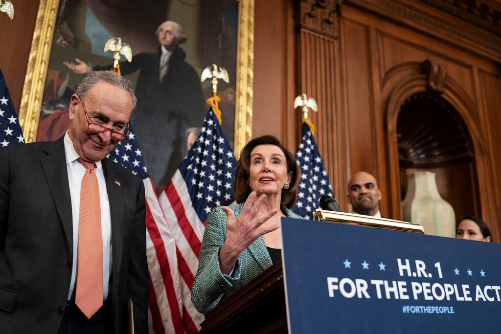 Senate Minority Leader Chuck Schumer, D-N.Y., left, and Speaker of the House Nancy Pelosi, D-Calif., call on Senate Majority Leader Mitch McConnell, R-Ky., to bring the Democrats' HR-1 "For the People Act" to the floor for a vote, during an event on Capitol Hill in Washington, Tuesday, March 10, 2020. (AP Photo/J. Scott Applewhite)