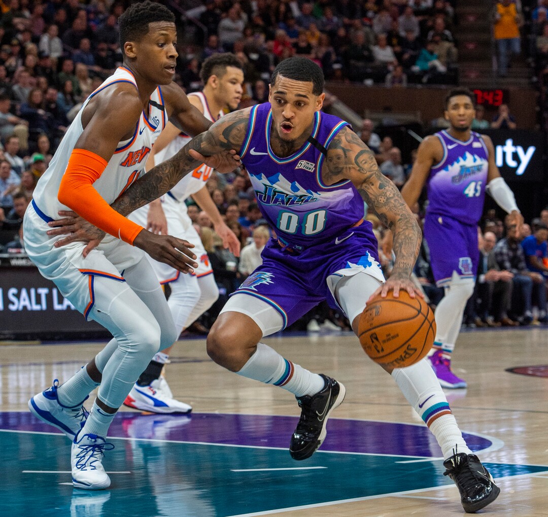 (Rick Egan  |  The Salt Lake Tribune)  Utah Jazz guard Jordan Clarkson (00) takes the ball inside, as New York Knicks guard Frank Ntilikina (11) defends, in NBA action between the Utah Jazz and the New York Knicks, in Salt Lake City, Wednesday, Jan. 8, 2020.
