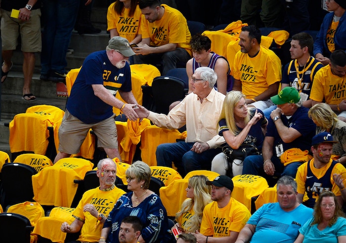 (Scott Sommerdorf | The Salt Lake Tribune)
A fan gave former Jazz head coach Jerry Sloan a handshake prior to the Jazz game 4 playoff match vs the Houston Rockets. The Rockets led the Jazz 58-48 at the half, Sunday, May 6, 2018.