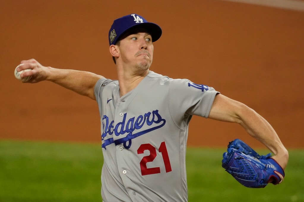 Los Angeles Dodgers starting pitcher Walker Buehler throws against the Tampa Bay Rays during the first inning in Game 3 of the baseball World Series Friday, Oct. 23, 2020, in Arlington, Texas. (AP Photo/Tony Gutierrez)