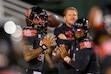 (Tyler Tate | AP) Utah quarterback Byrd Ficklin, left, and quarterback Devon Dampier, right, warm up before an NCAA college football game against Cincinnati, Saturday, Nov. 1, 2025, in Salt Lake City, Utah.