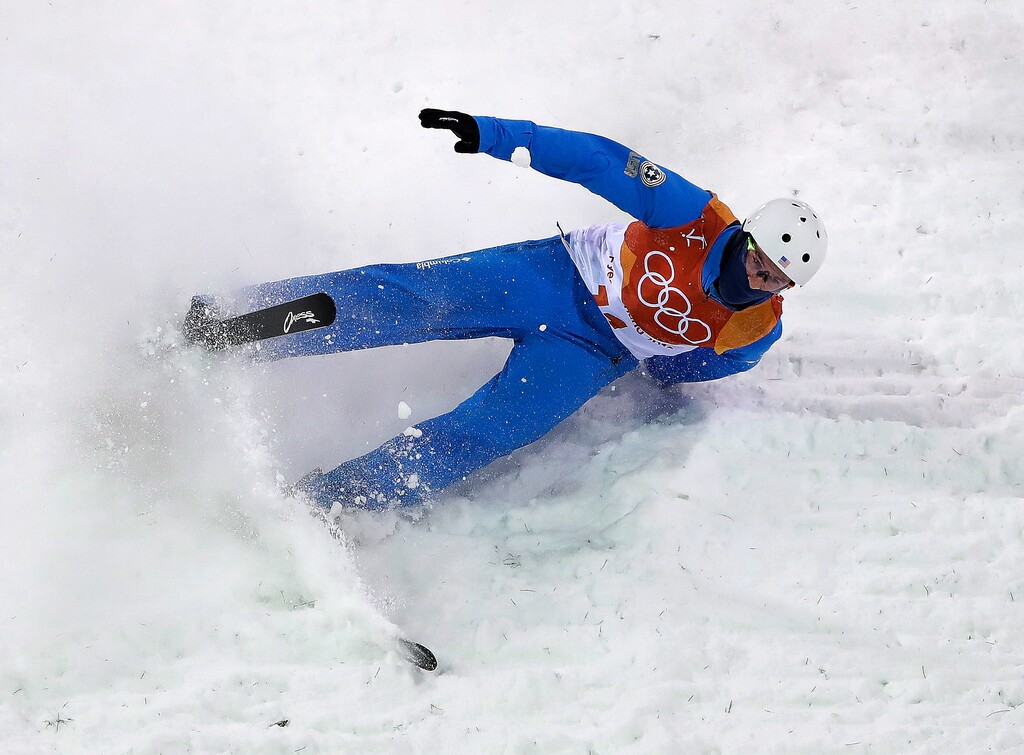Mac Bohonnon, of the United States, crashes during the men's aerial qualifying at Phoenix Snow Park at the 2018 Winter Olympics in Pyeongchang, South Korea, Saturday, Feb. 17, 2018. (AP Photo/Gregory Bull)
