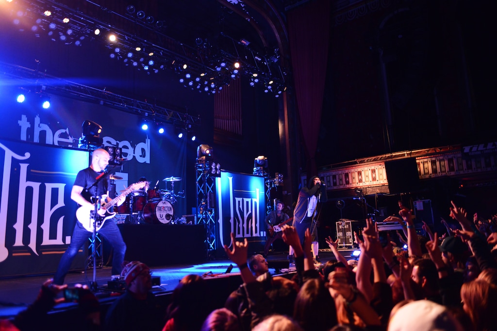 (Robb D. Cohen | (Invision/AP file photo) Quinn Allman, Bert McCracken, Dan Whitesides, Jeph Howard of The Used, perform at The Tabernacle in Atlanta on Monday, Feb. 4, 2013. Allman is suing McCracken, Howard and The Used, LLC, for damages after they kicked him out of the band in 2015.