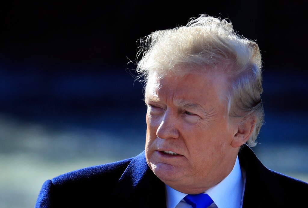 (AP Photo/Manuel Balce Ceneta) President Donald Trump walks on the South Lawn as he leaves the White House in Washington, Friday, Jan. 5, 2018, enroute to Camp David, Md., to participate in congressional Republican leadership retreat.