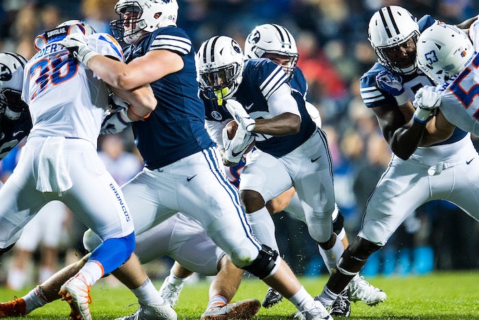 (Chris Detrick  |  The Salt Lake Tribune)  Brigham Young Cougars running back Squally Canada (22) attempts to run the ball during the game LaVell Edwards Stadium Friday, October 6, 2017. 