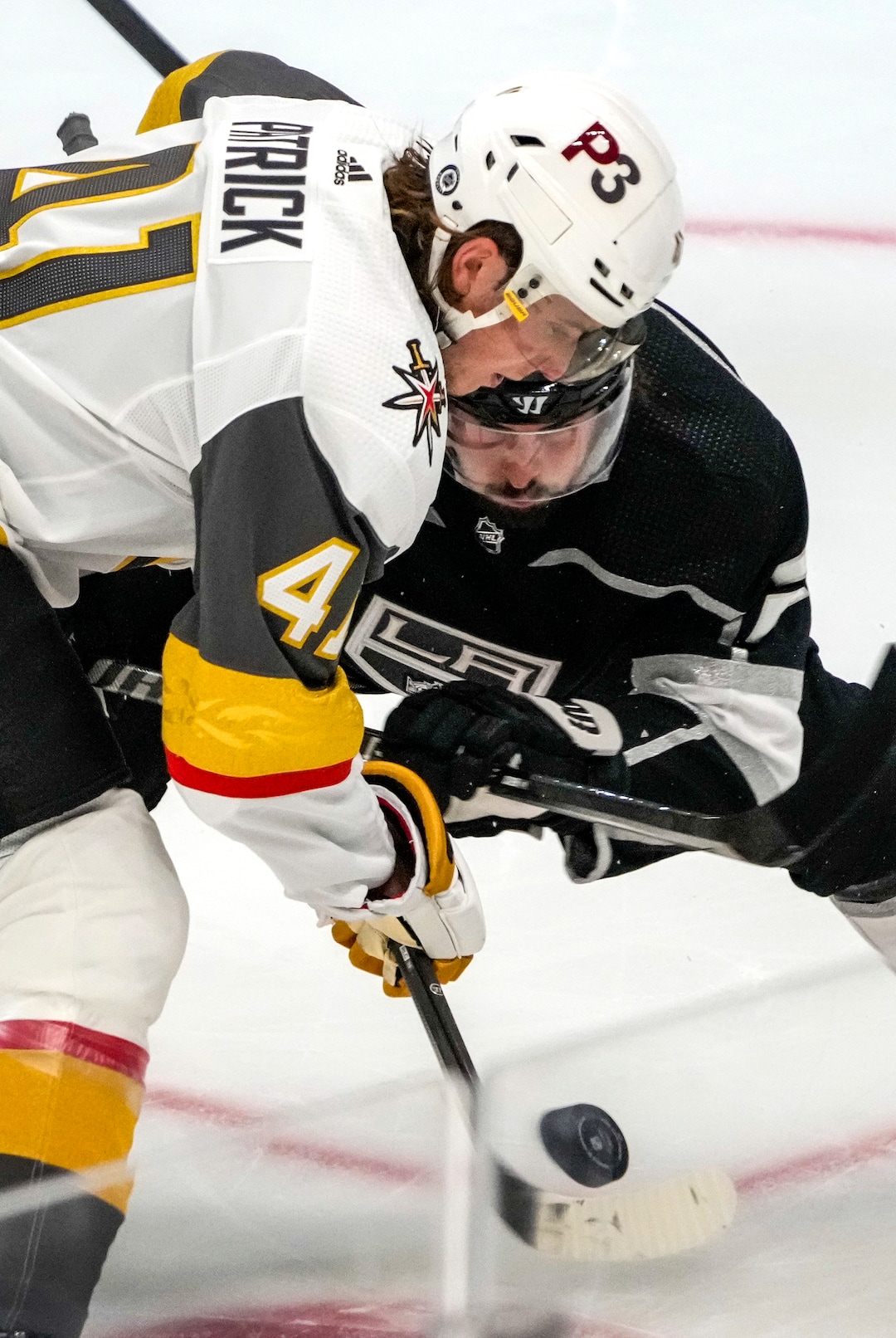 (Leah Hogsten | The Salt Lake Tribune) Vegas Golden Knights center Nolan Patrick (41) faces off against Los Angeles Kings left wing Phillip Danault (24) as the Los Angeles Kings and Vegas Knights meet in a preseason game at Vivint Arena on Sept. 30, 2021.