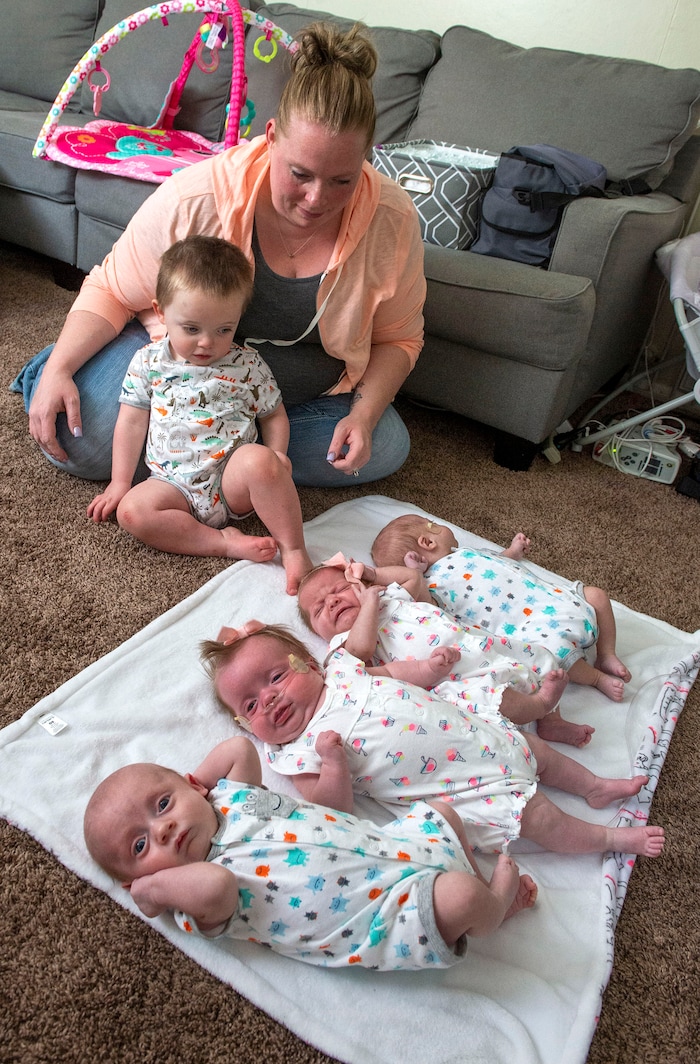 (Rick Egan  |  The Salt Lake Tribune)       Kayla Glines, with her son Parker, and quadruplets, Reese, Lincoln, Oaklee and Jamesen at her home in Ogden, Saturday, June 15, 2019.