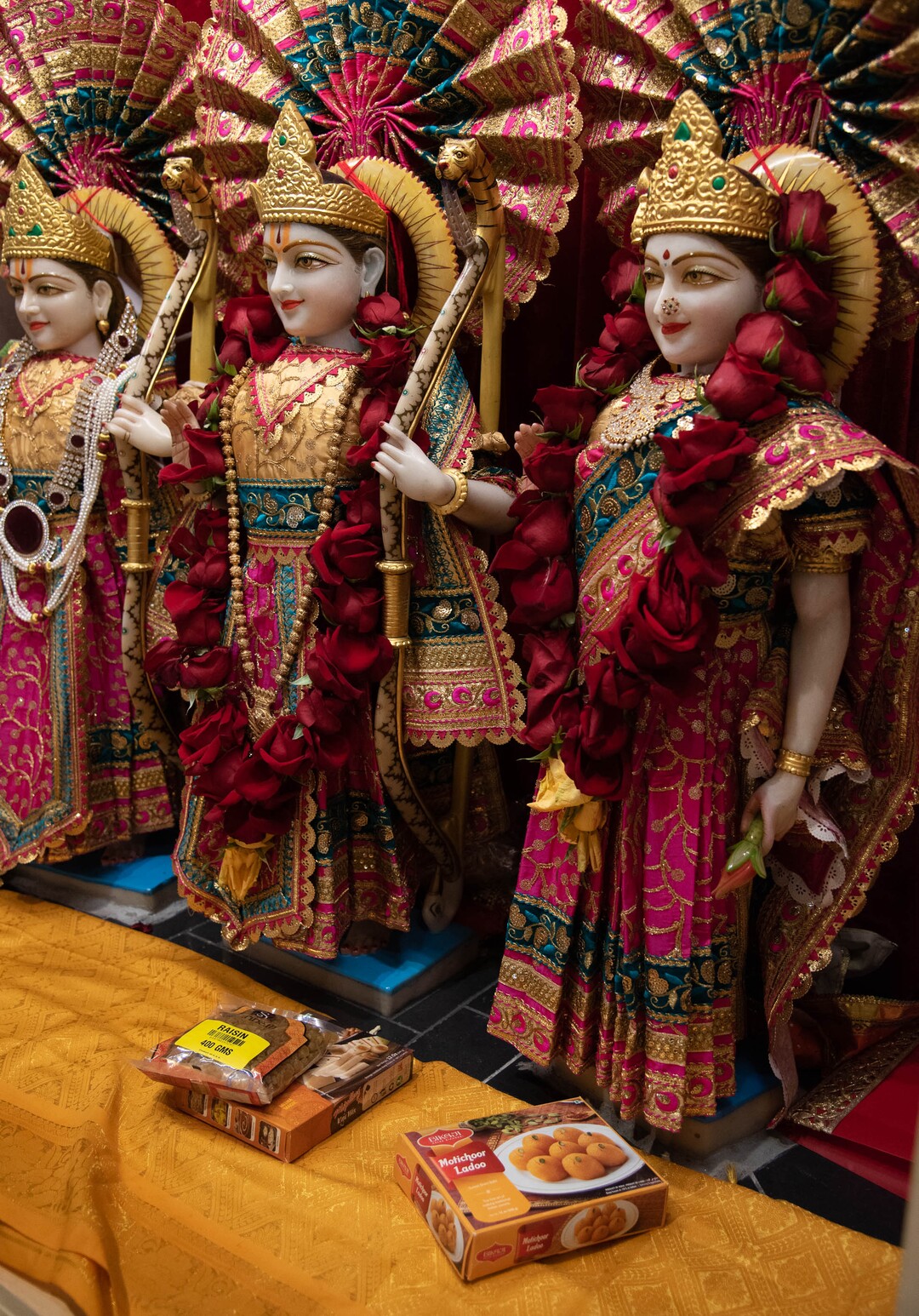 (Francisco Kjolseth  |  The Salt Lake Tribune) Colorful vestige adorns a shrine of Sri Ram Parivar with food offerings as Hindus cope with the coronavirus pandemic by limiting visitors to the Sri Ganesha Hindu Temple in South Jordan and broadcast daily ceremonies online.