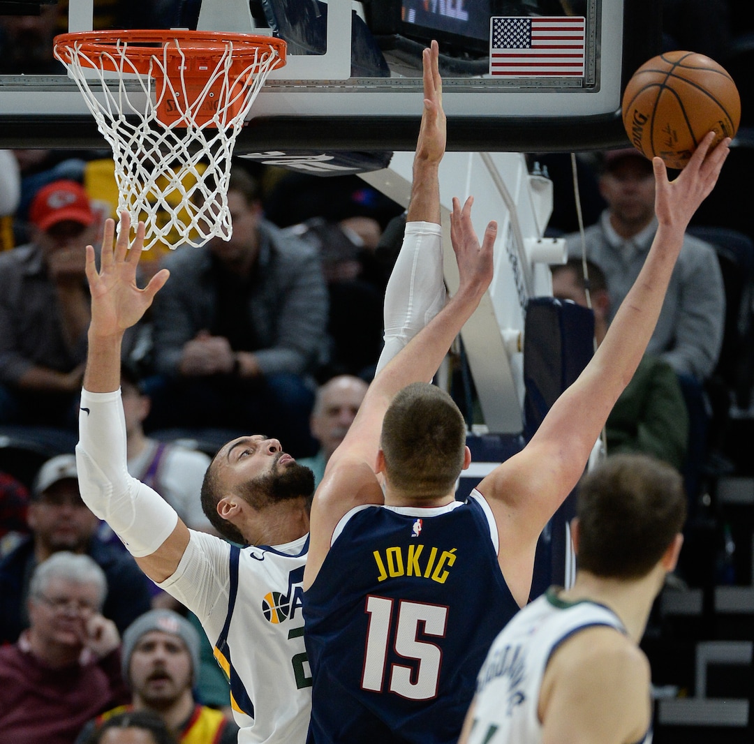 (Francisco Kjolseth  |  The Salt Lake Tribune) Utah Jazz center Rudy Gobert (27) blocks Denver Nuggets center Nikola Jokic (15) as the Utah Jazz host the Denver Nuggets in their NBA basketball game at Vivint Smart Home Arena in Salt Lake City on Wednesday, Feb. 5, 2020.