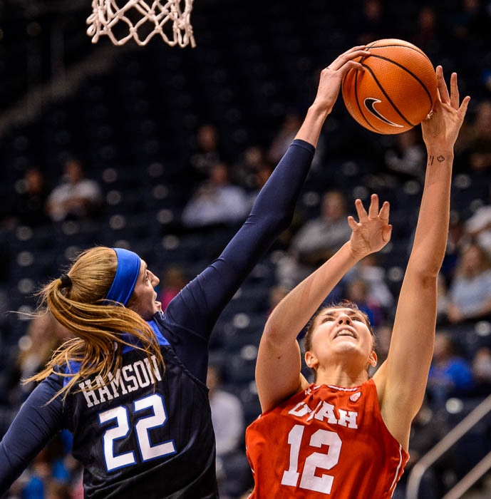 (Trent Nelson | The Salt Lake Tribune)  Brigham Young Cougars center Sara Hamson (22) blocks a shots by Utah Utes forward Emily Potter (12) as BYU hosts Utah, NCAA women's basketball in Provo, Saturday, Dec. 9, 2017.
