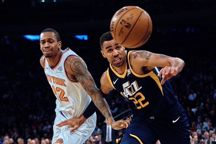 Utah Jazz's Joe Ingles, right, competes for the ball with New York Knicks' Lance Thomas (42) during the first half of an NBA basketball game at Madison Square Garden in New York, Wednesday, Nov. 15, 2017. (AP Photo/Andres Kudacki)